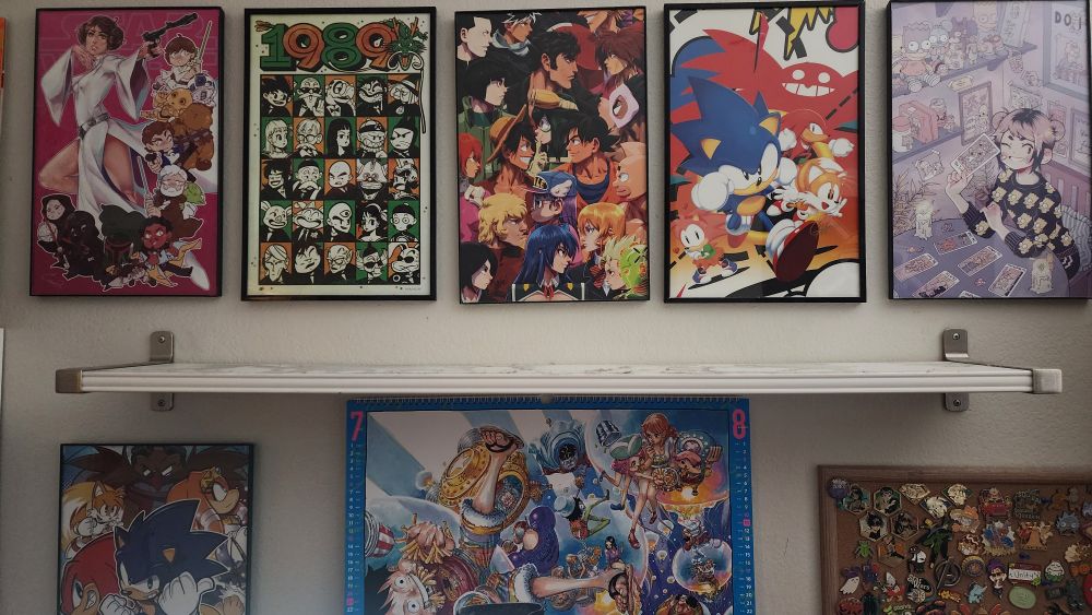A wall shelf not filled with Sanji figures and Sanji related accessories