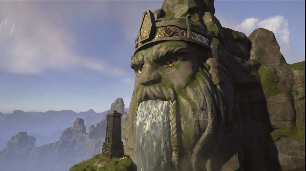 A high mountain top with the face of a dwarven king carved into it. Gold and black marble inlay a crown decorated with knotwork inspired by celtic knots. A waterfall spills from the face's mouth.
On a smaller peak close by, in front of the face, a black marble obelisk stands as a grave marker. It shares golden iconography with the crown, and has runic script.
The scene is warmly lit, just as the sun begins to set.
