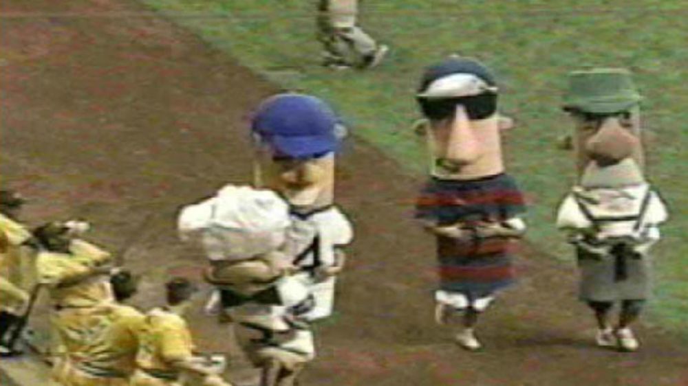 Randall Simon hitting a sausage during the sausage race