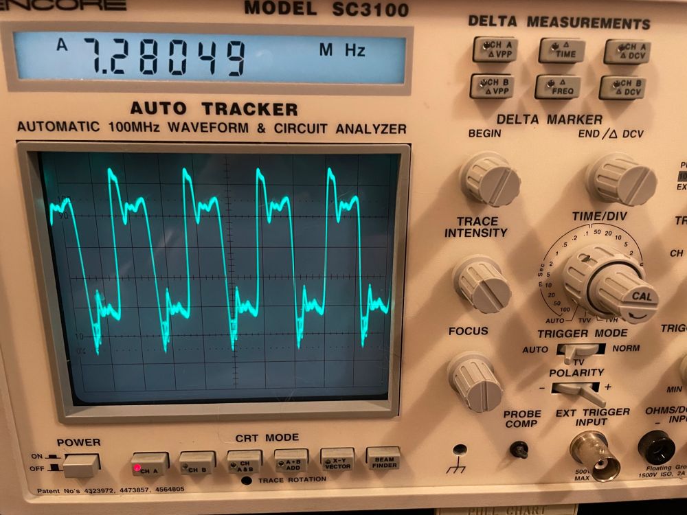 An analog oscilloscope showing a 7.2MHz square wave