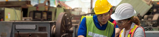 Male and female in a manufacturing setting