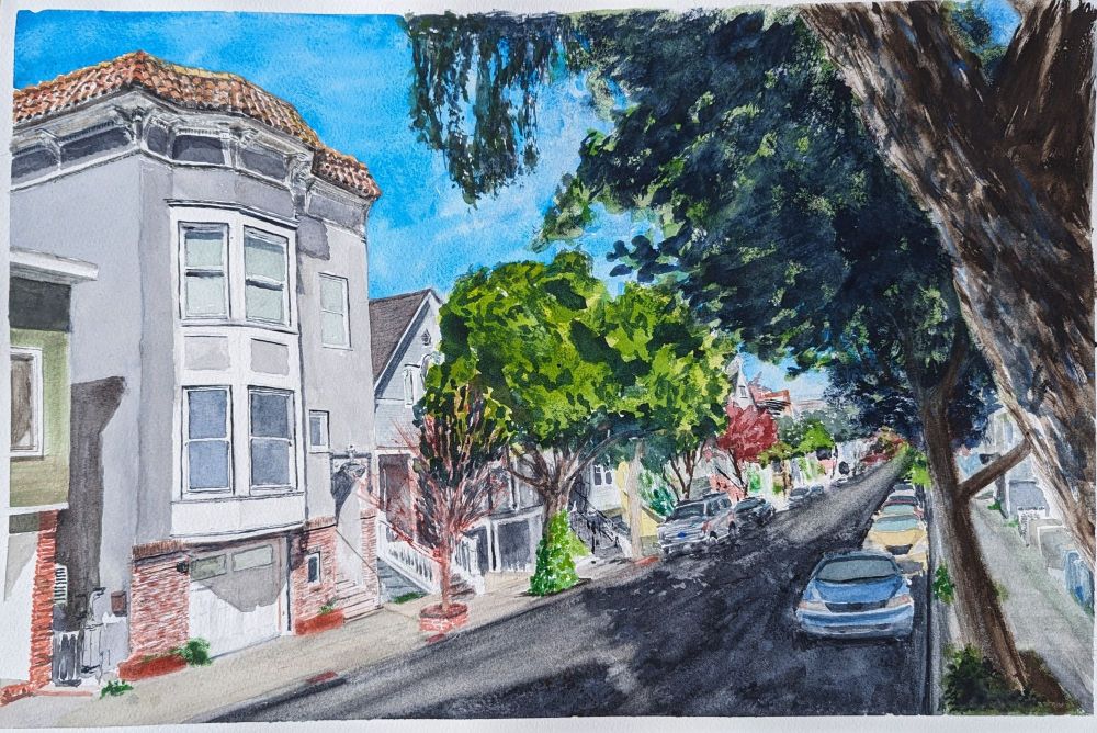 We stand at the base of a dark, leafy tree, looking across and down a narrow San Francisco street lined with Victorian-era houses and trees with leaves of various colors.