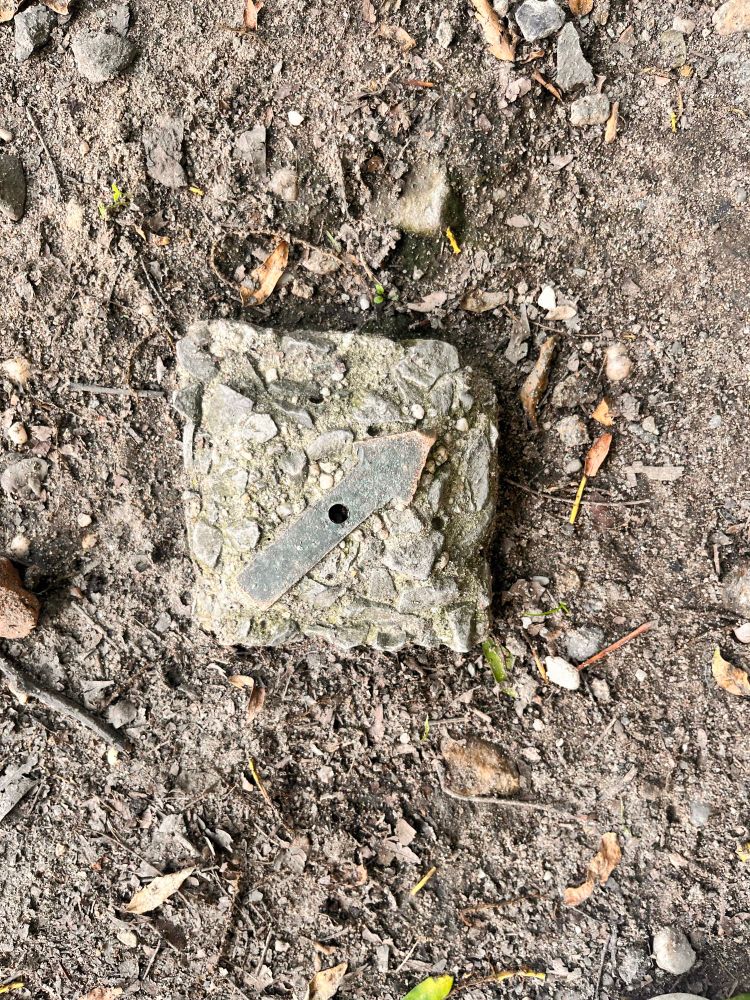 One of the brass arrows described