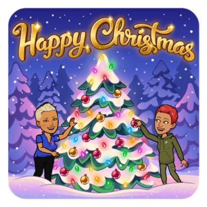 Cartoon of Cristina and her wife Kate standing beside a Christmas Tree covered in lights and baubles 