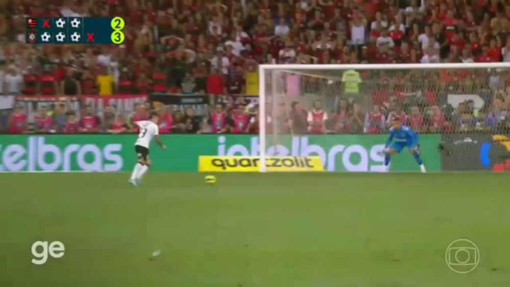 a soccer game is being played in front of a banner that says quartzolit