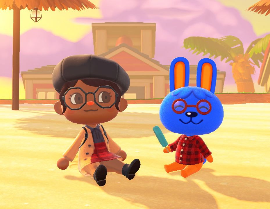 My ACNH rep at HHP sitting down next to a cutie named Doc, who is a blue rabbit 
