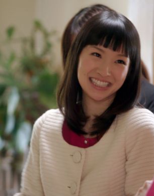 a screenshot of Marie Kondo, smiling, saying "I love mess."