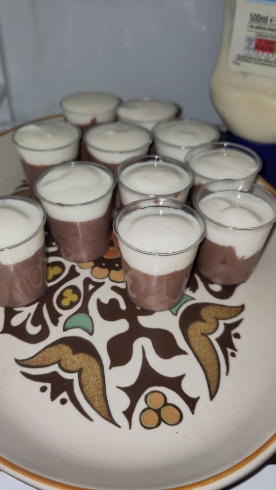Here's some I prepared earlier. 
Chocolate yoghurt on the bottom, vanilla on top, these taster pots are half a syn each.