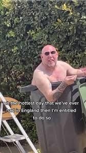 Man bathing in a wheely bin