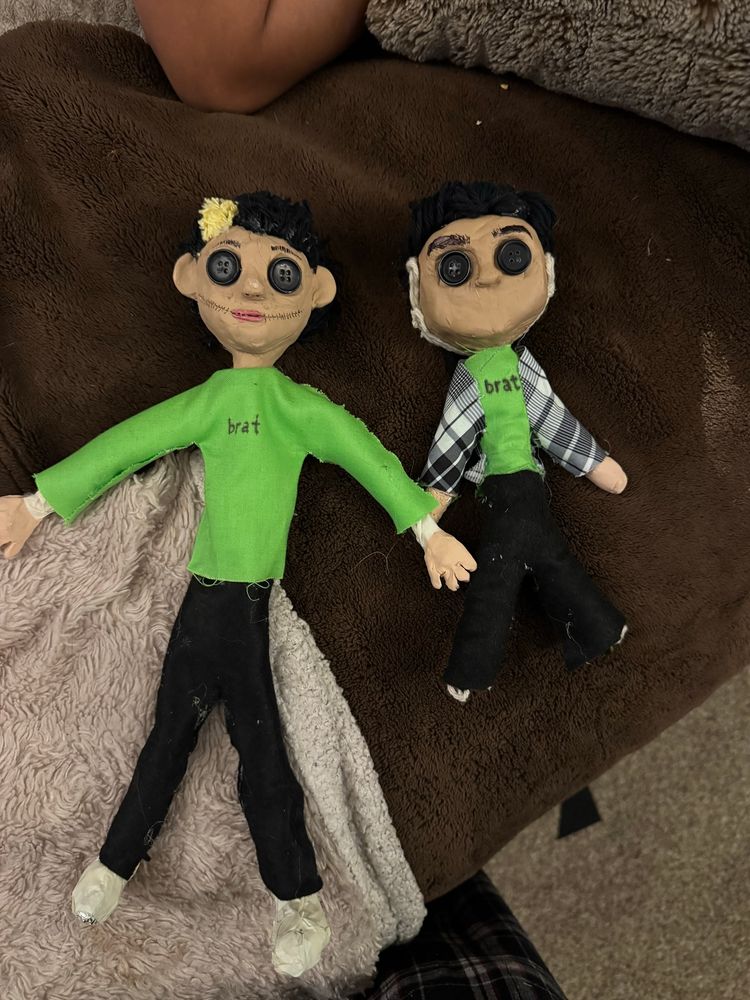 Home made Coraline dolls wearing brat shirts 