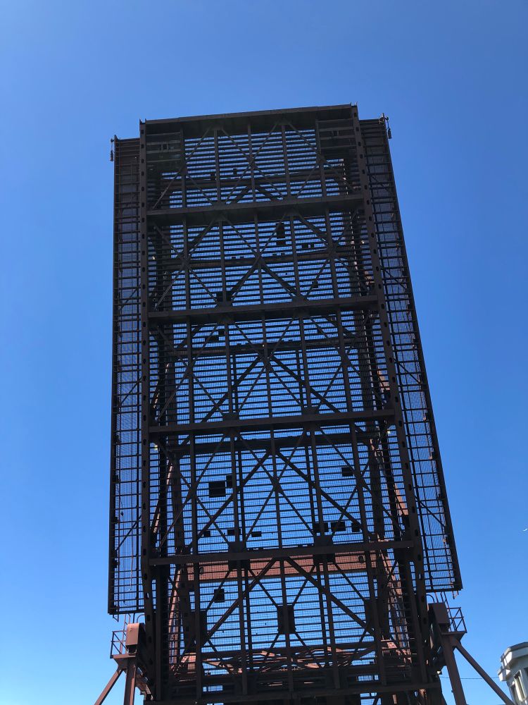 The McArdle drawbridge connecting East Boston & Chelsea, seen open from a boat passing underneath on its way up Chelsea Creek