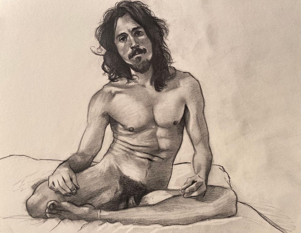 A graphite drawing of a nude male seated on a bed 