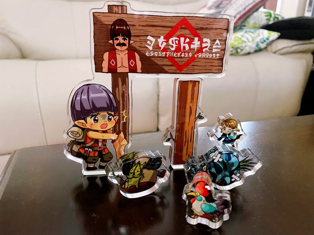 Acrylic stacking blocks featuring Addison from The Legend of Zelda: Tears of the Kingdom. He comes with several pieces to help him support Mr. Hudson!