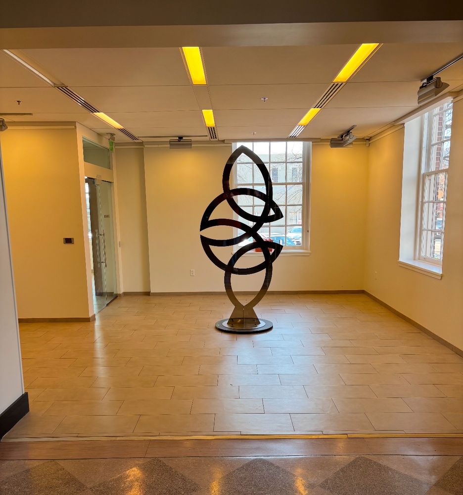 This shows a piece of sculpture based on my old business card. The form is a representation of two conjoined trefoil knots.