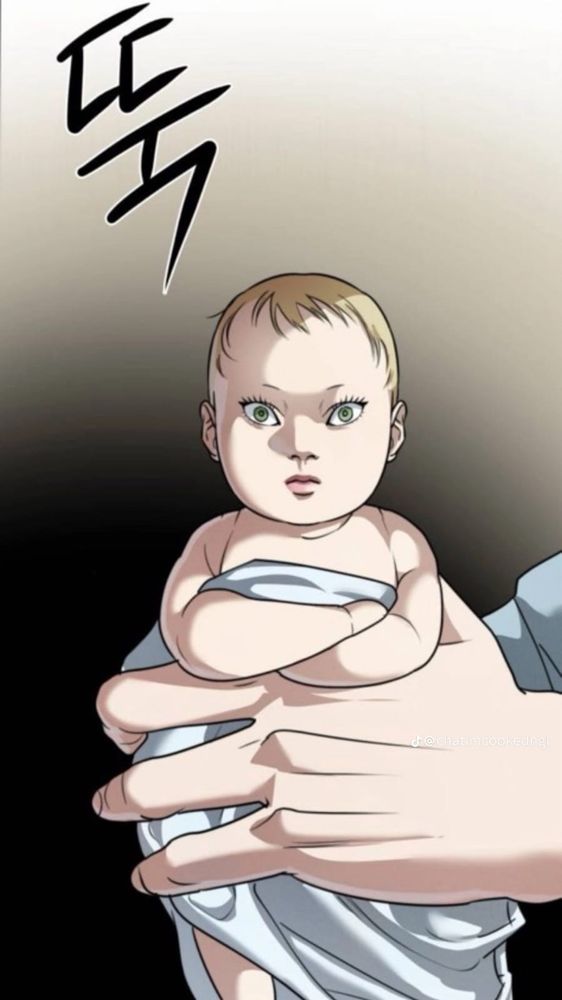 bebe de braços cruzados e um olhar penetrante de mil jardas, sério e sem chorar.