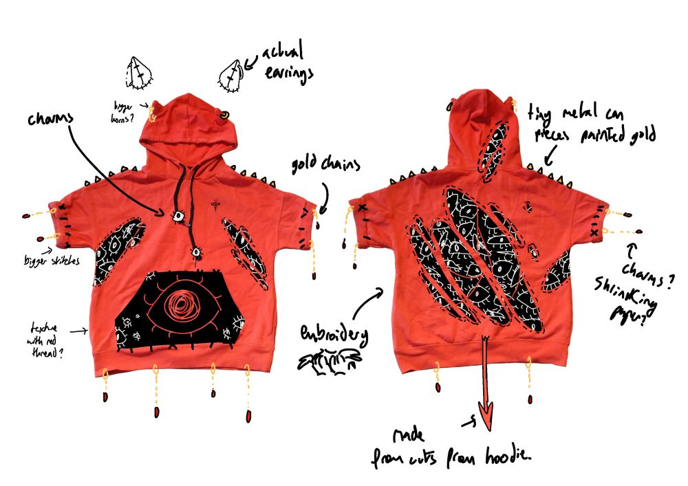A red hoodie with black slashes all over it. in the black slashes are a lot of white eyes. The front pocket is black and has a giant red eye on it. The sleeves and bottom of the hoodie have golden chains finished with red "gems" to look like blood droplets. The hood has two horns with piercings on it.