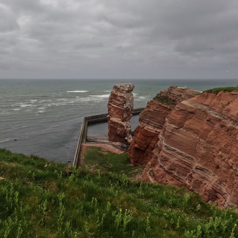 cliffs of Heligoland below cloudy sky