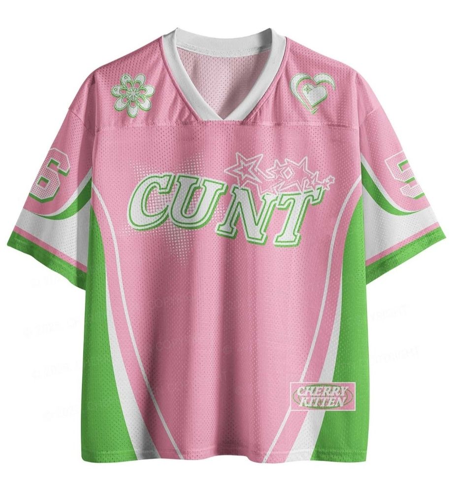 a pink and green sports-style t shirt that says "cunt" on the front