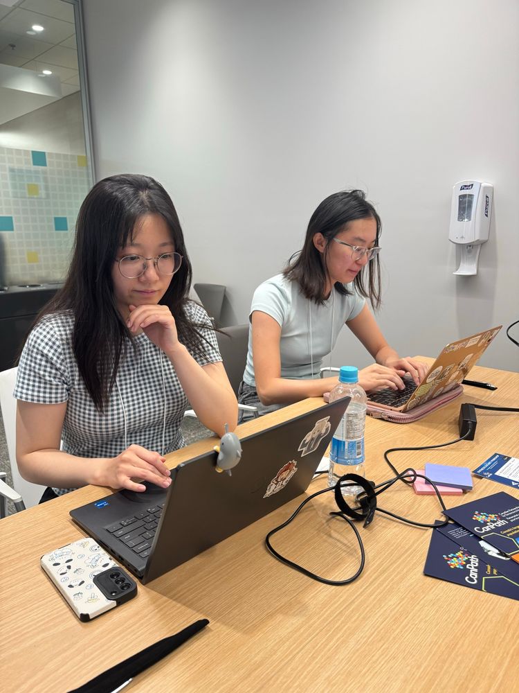 Trainees working on their laptops