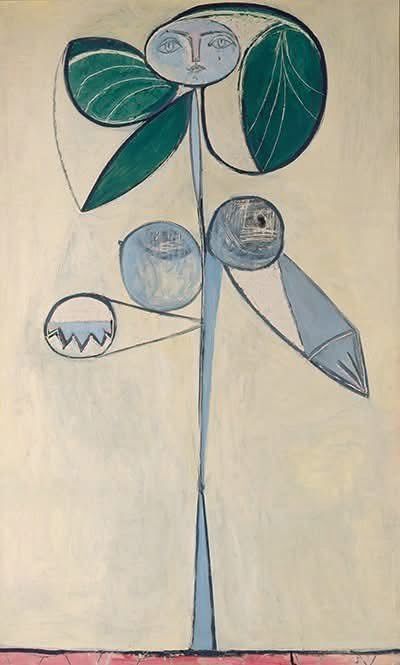 Painting by Pablo Picasso titled “La Femme-Fleur” (1946), depicting a stylized female figure as a flower, composed of abstract geometric shapes; the face appears between two large green leaves at the top, with the body suggested by stems and circular and triangular forms in shades of blue on a pale beige background.