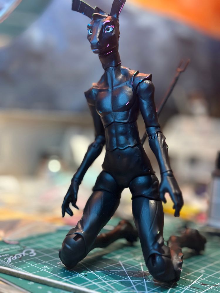 Ball jointed doll of cay kneeling