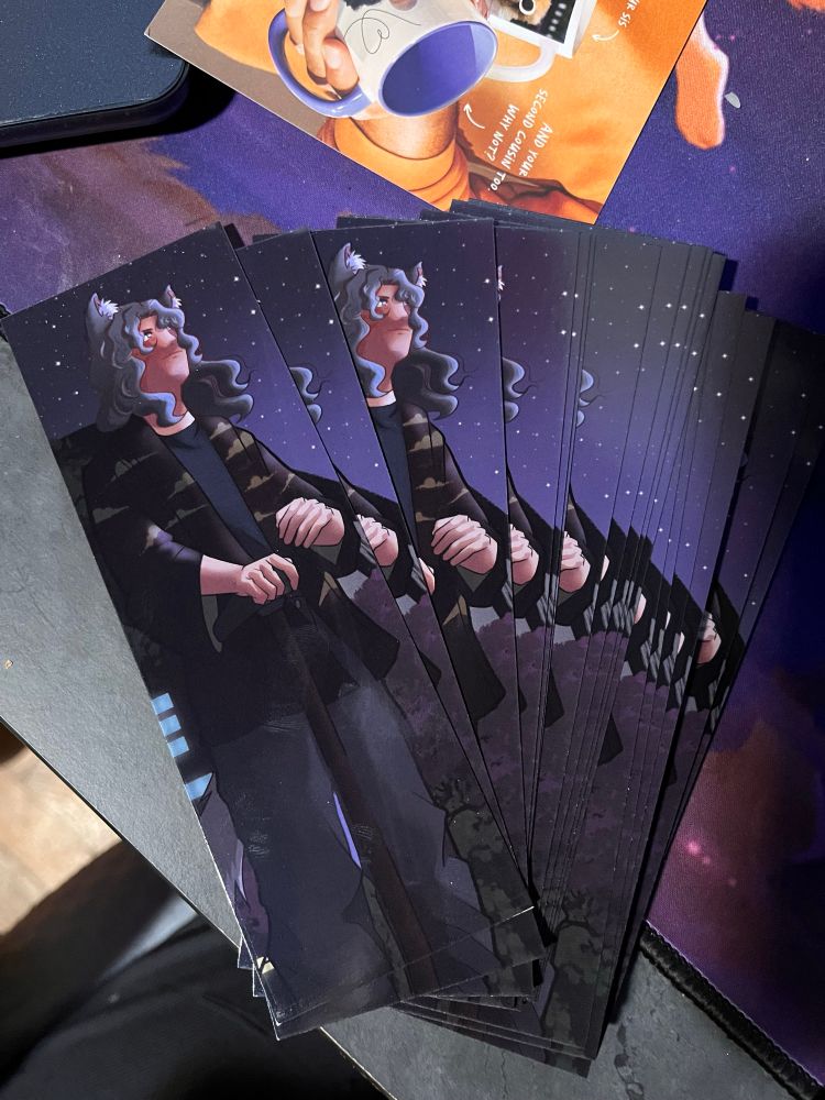 A photo of a stack of bookmarks featuring Lysander fanning out