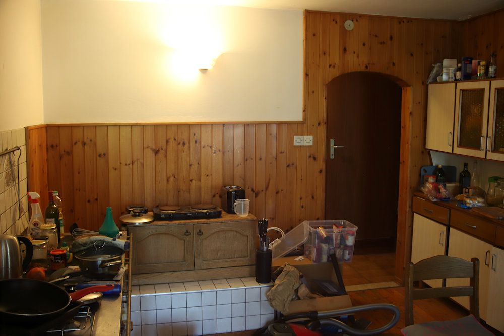 Old rustic kitchen with wood-fired range