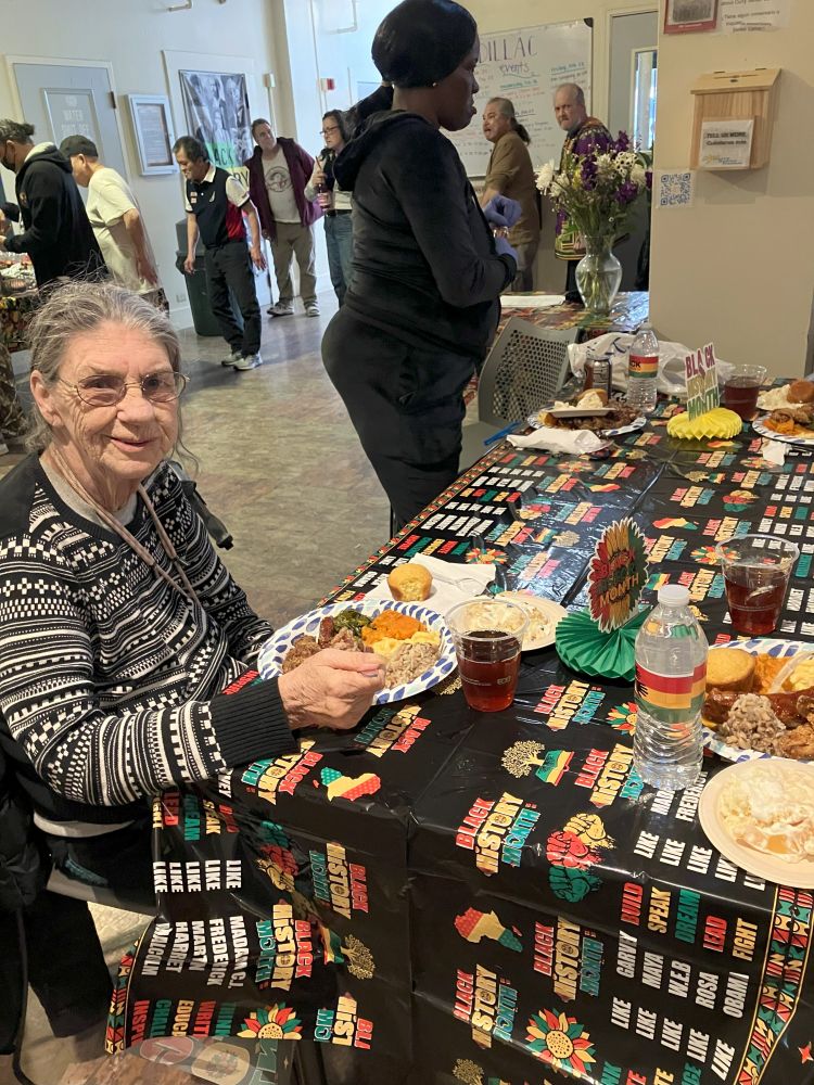 A Cadillac resident enjoys their lunch. 