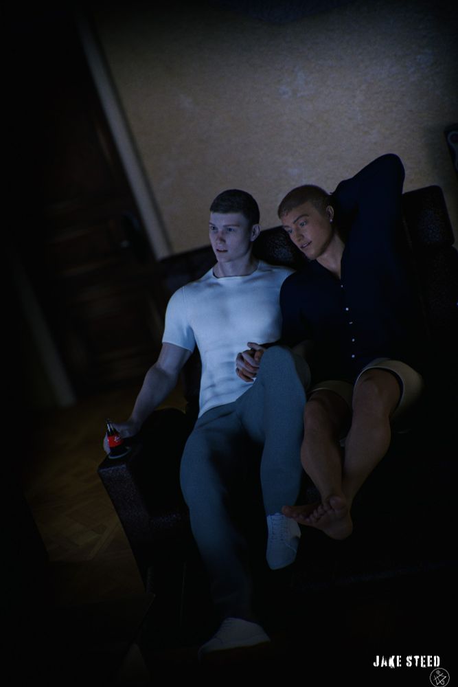 Two young men, seated together  on a loveseat, in the dark, legs touching, holding hands, lit by the glow of a TV possibly. One appears amused, the other slightly shocked.