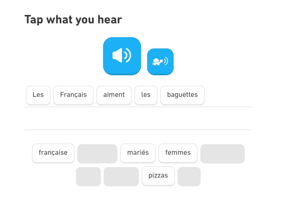 Duolingo のプレイ画面。Les Francais aiment les baguettes.