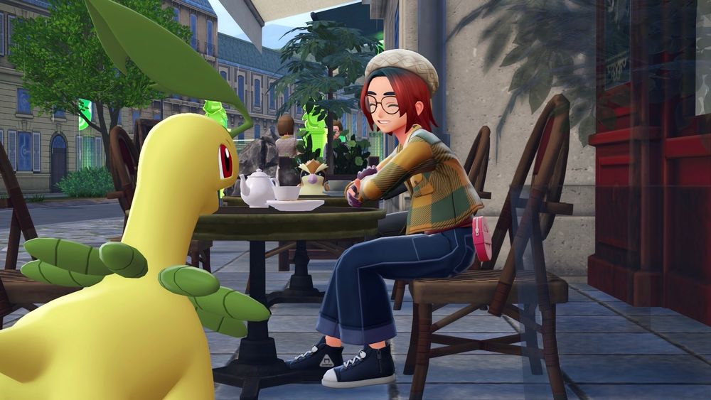 Screenshot of my character with a leaf Pokemon sitting at an outdoor cafe table.