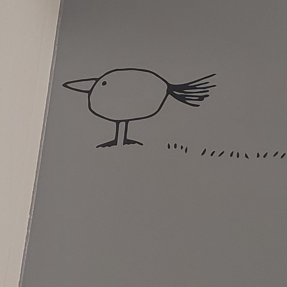 Very simple drawing of a bird made out of only basic shapes