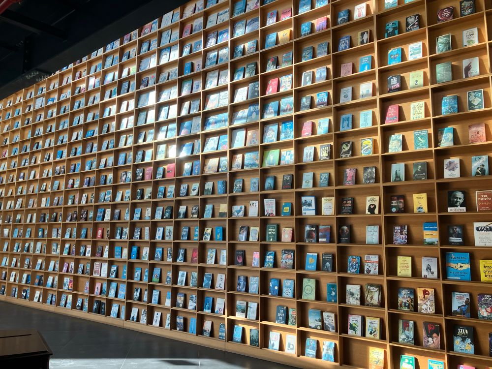 A wall display of various books 
Entryway to the building of Kineret, one of the biggest publishers in Israel 