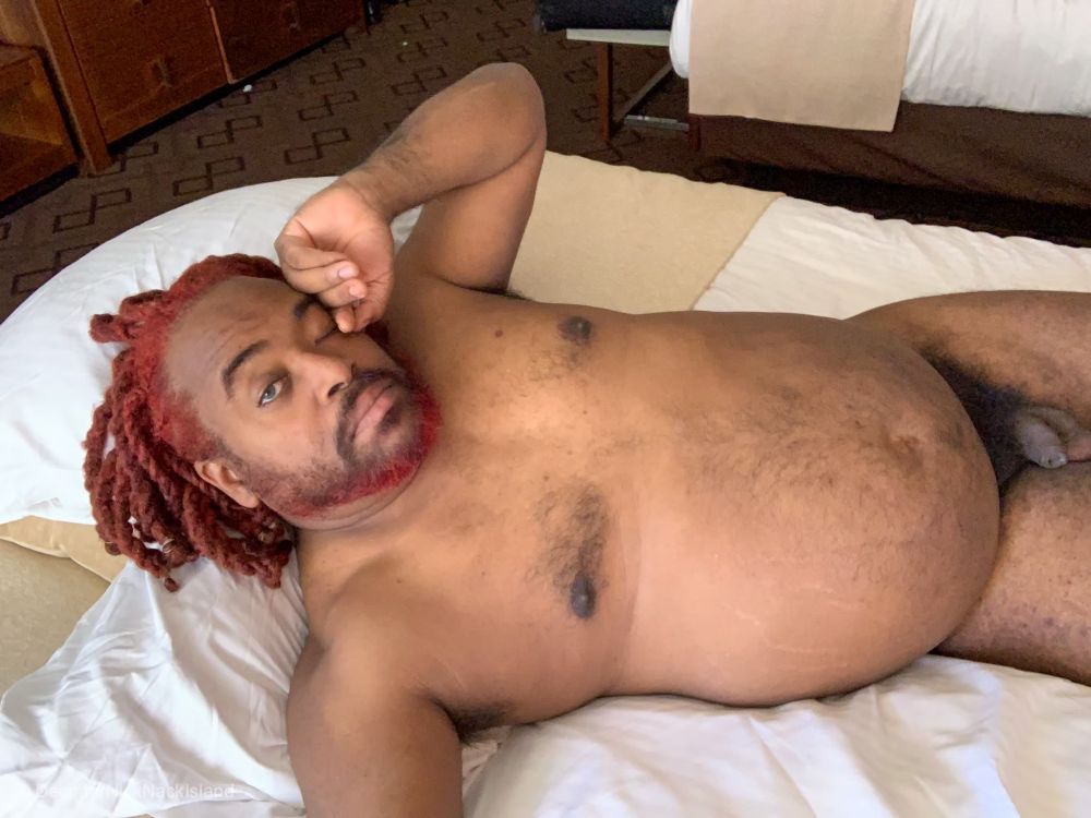 Nude in bed in Vegas rubbing my eye . Reclines on bed.