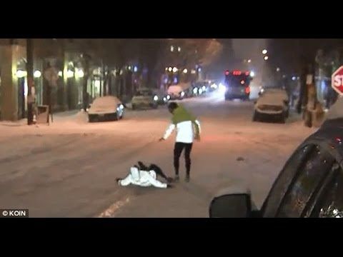 Hilarious!!! Jogger Tells TV Reporter 'snow is 'perfect for running' and falls on HER BUTT Live