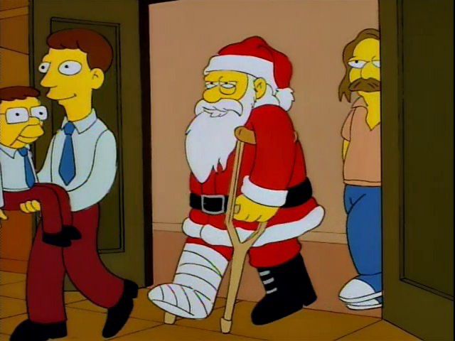 Simpsons screencap, featuring a parade of Hutz’s surprise witnesses entering the courtroom, including a man in a tie with a ventriloquist dummy, a Santa Claus with his right leg in a cast and on crutches, and a man dressed like Barney Gumble who looks like David Crosby (scraggly mustache and long hair)