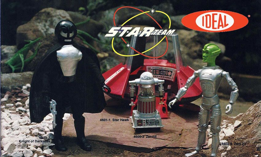 A photograph of Ideal’s 1977 Star Team action figures: the Knight of Darkness. Zeroid, and Zem 21. They bear a slight resemblance respectively to Darth Vader, R2-D2, and C-3PO but are also completely distinct; for example, Zem 21 has a green head which resembles a human being wearing a space helmet which is a different color from his silver body.
