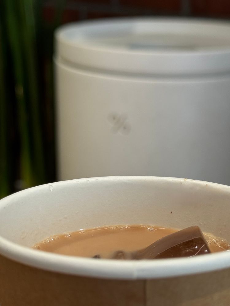 Paper cup for an iced “dark latte” at %Arabica