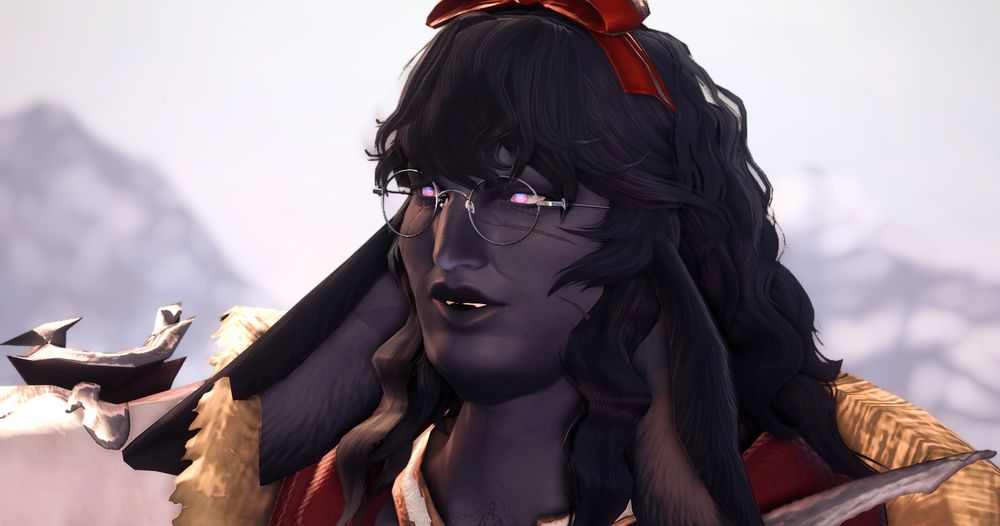 dami smirking and looking to the side