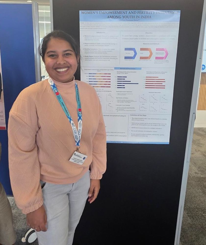 Image shows Lekshmi Prasannan Reeba from The London School of Economics and Political Science who won the #PopFest2025 conference poster competition last week, standing in front of their poster on:

Women's empowerment and #fertility intentions among youth in #India 