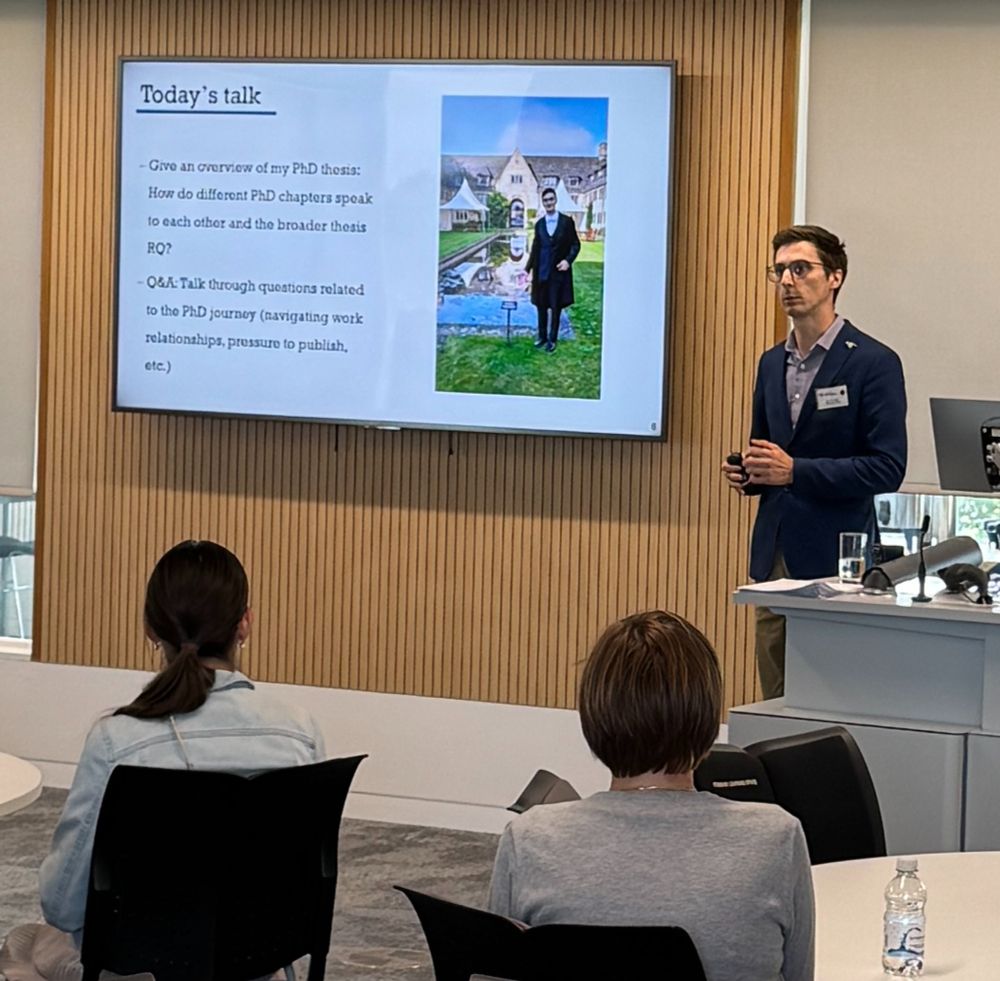 Image shows Dr Antonino Polizzi giving a keynote speech in front of a PowerPoint screen at the PopFest2025 conference at the University of Soutampton. Antonino’s research focus lies in the interplay between economic inequality, particularly poverty, and health over the life course. 