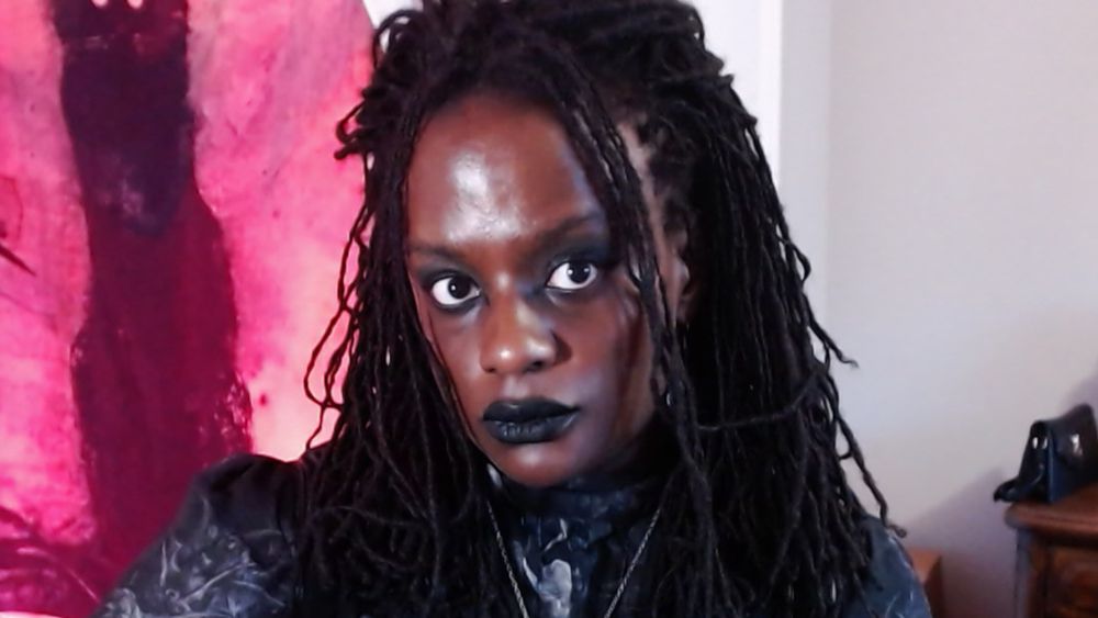 sheron making pouting face for webcam camera at desktop