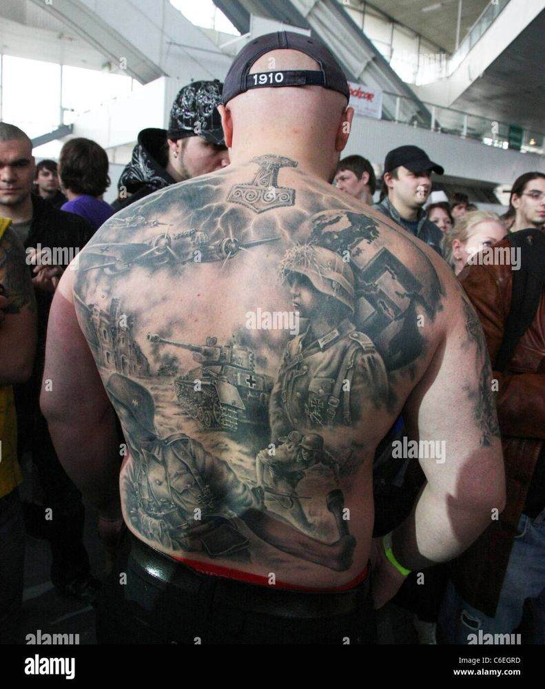 A massive back tattoo of German soldiers and a tank