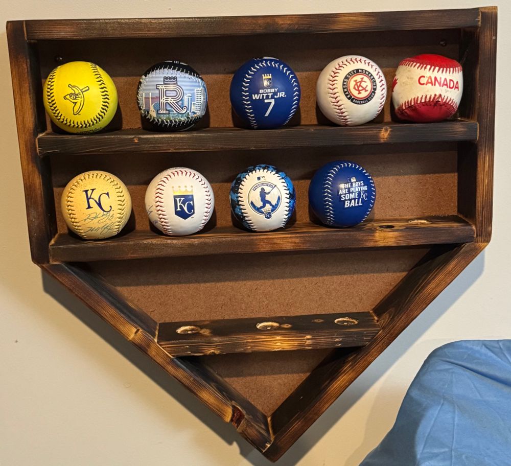 A home-plate shaped baseball display case