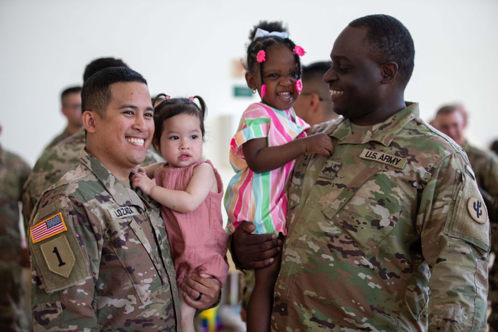 Soldiers interacting with kids