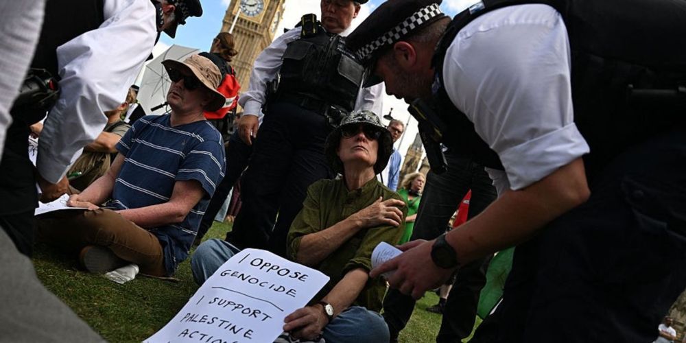 British campaigners in London's Parliament Square demand reversal of proscription of Palestine Action, facing arrests by Metropolitan Police. Over 200 arrested for peaceful protest against genocide in...