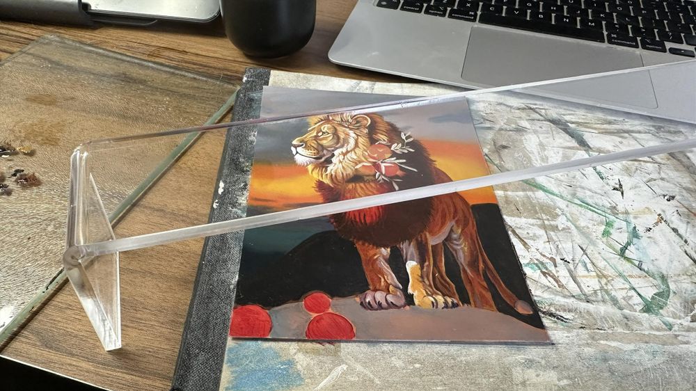 oil painting of a lion and some pomegranates 