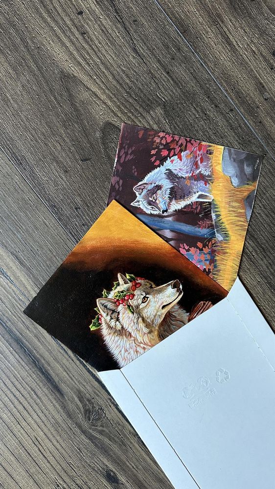 Two small painting in an envelope, wolves and autumn leaves