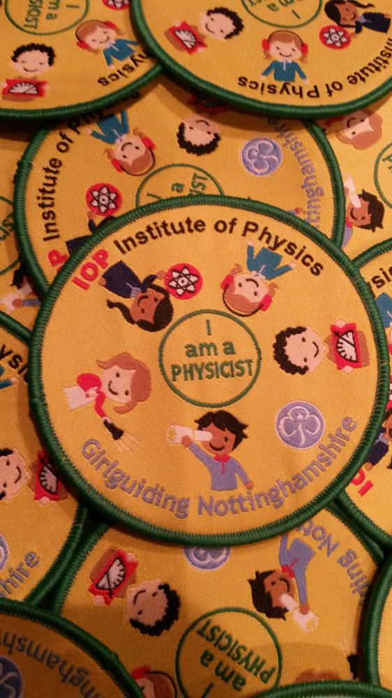 Image of the Girlguides "I am a Physicist" badge.