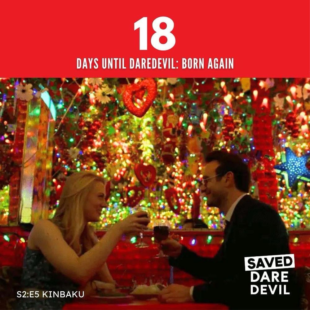 Screenshot from season 2, episode 5 of Daredevil, titled “Kinbaku.” Matt and Karen are sitting in a colorful Indian restaurant, toasting with their classes of wine. Text reads “18 days until Daredevil Born Again. Saved Daredevil.”